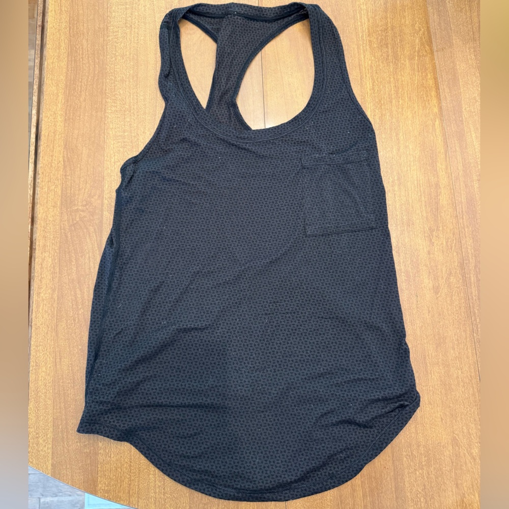 Black patterned Lululemon top with pocket